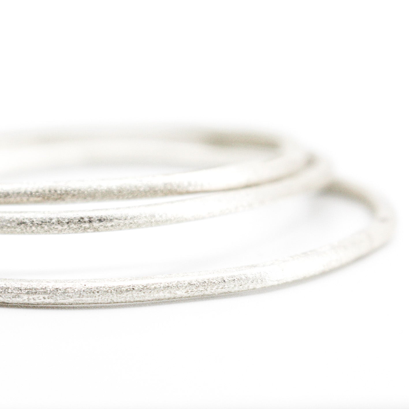 set of 3 stackable silver bangles • sterling silver, free form, textured