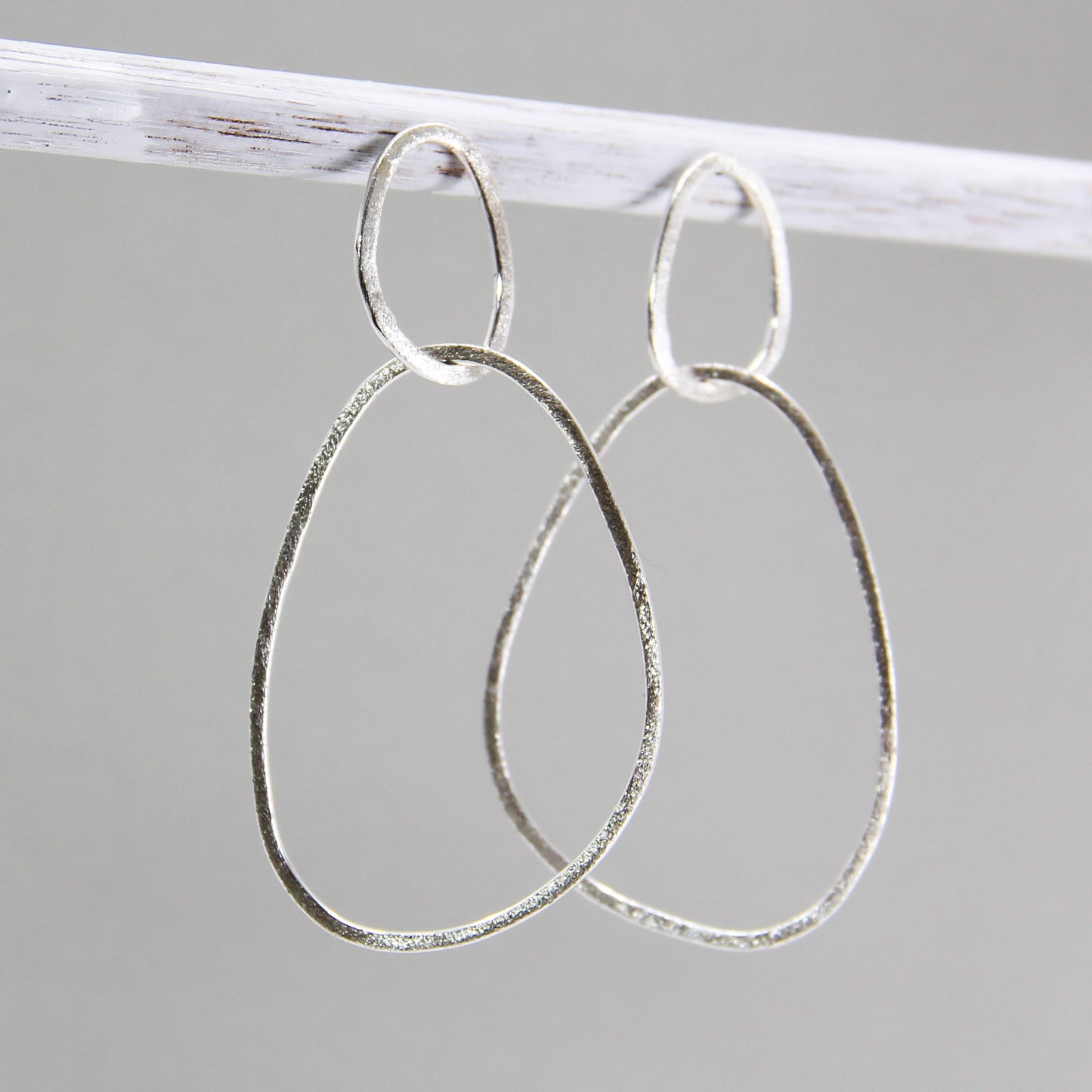 long minimalist dangly earrings in 925 sterling silver with organic shapes, short length