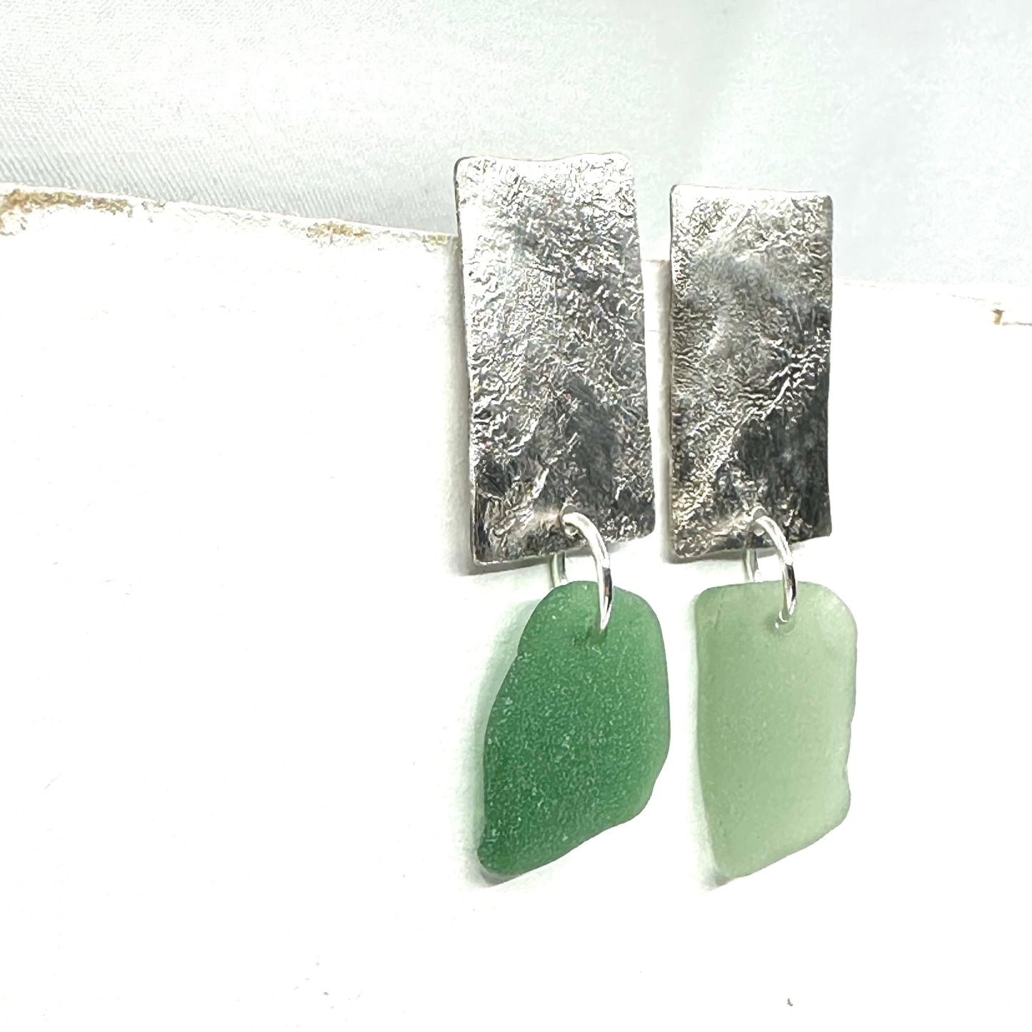 minimalist dangly silver earrings with green French seaglass  • mismatched