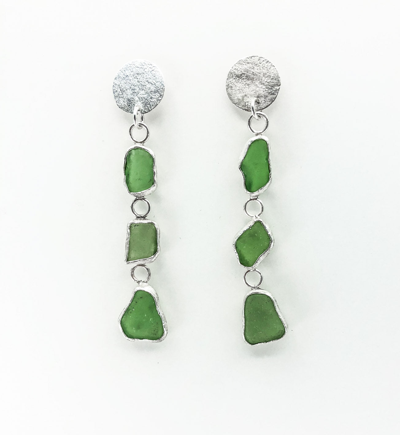 long green dangling sea glass earrings with textured 925 sterling silver disc