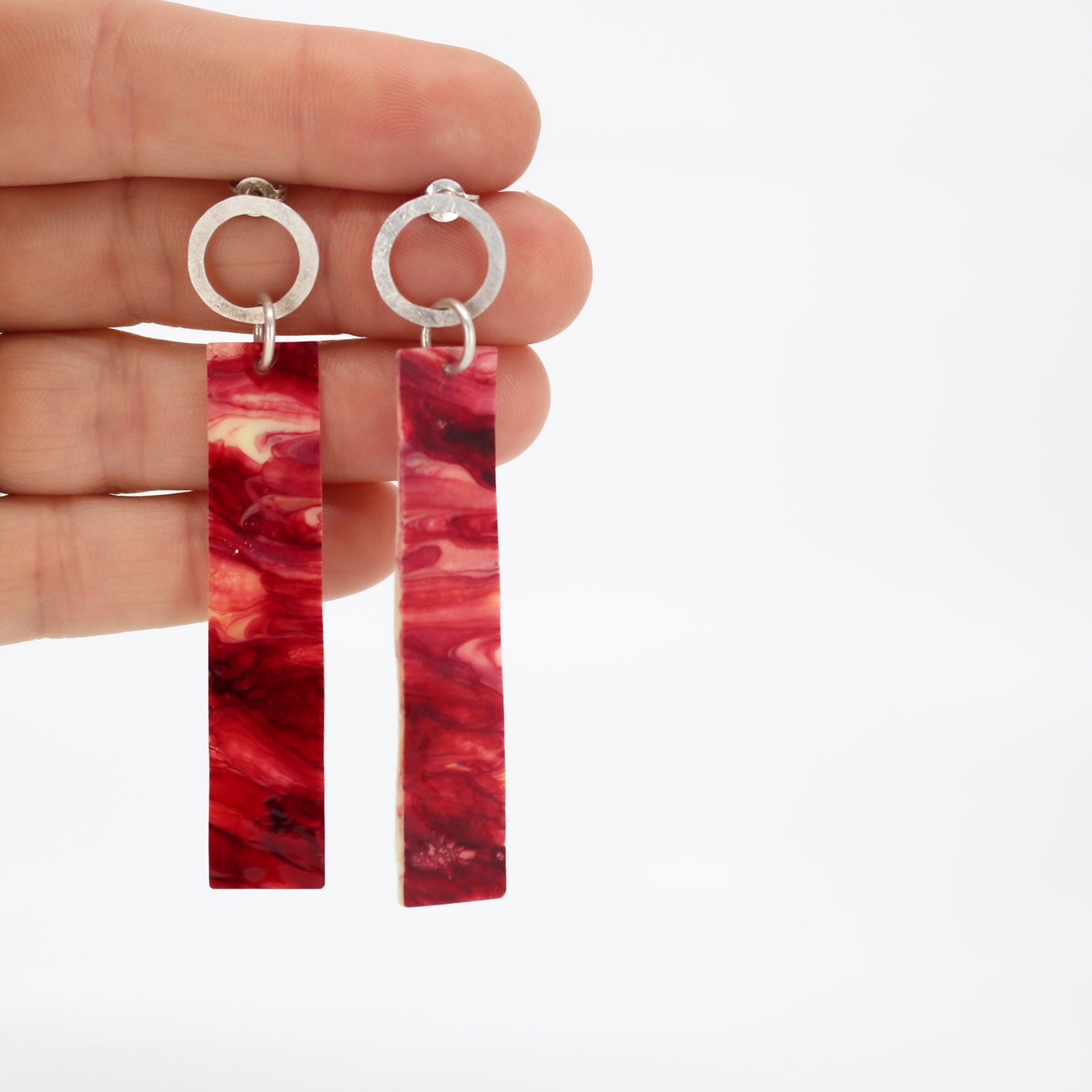 long dangling earrings • hammered sterling silver circle • red marbled resin element