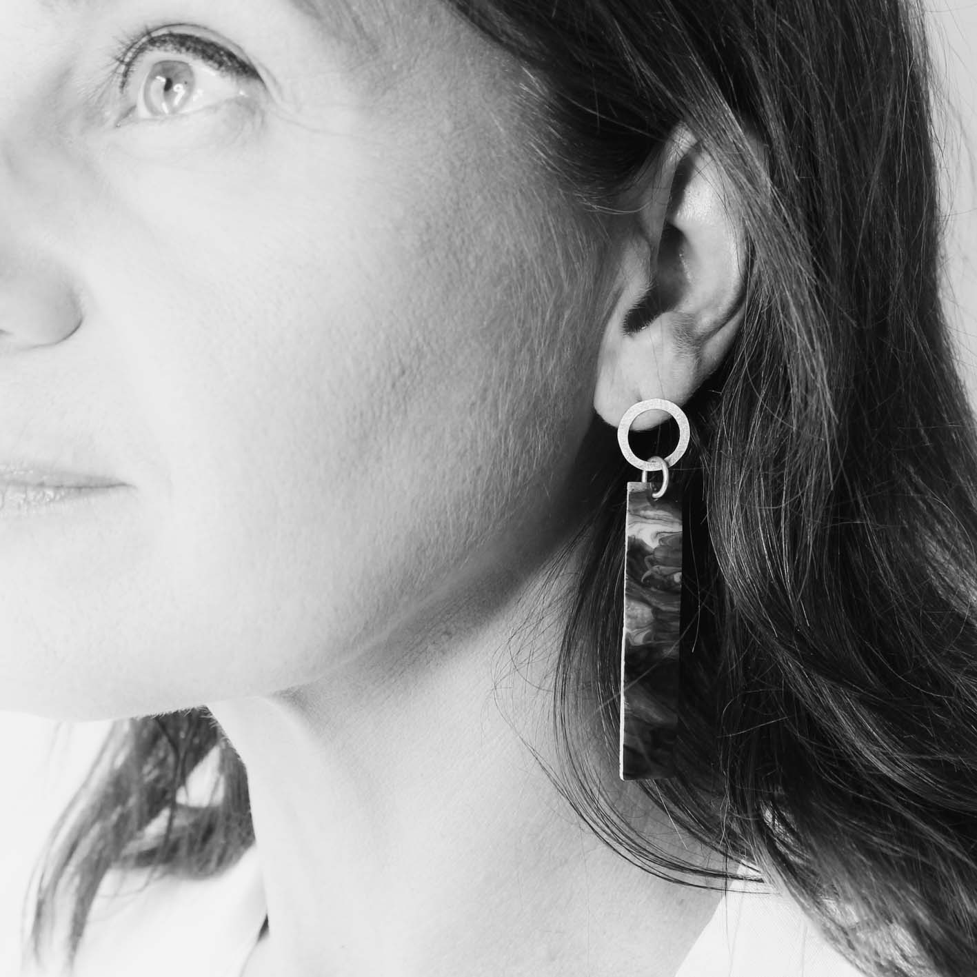 long dangling earrings • hammered sterling silver circle • red marbled resin element