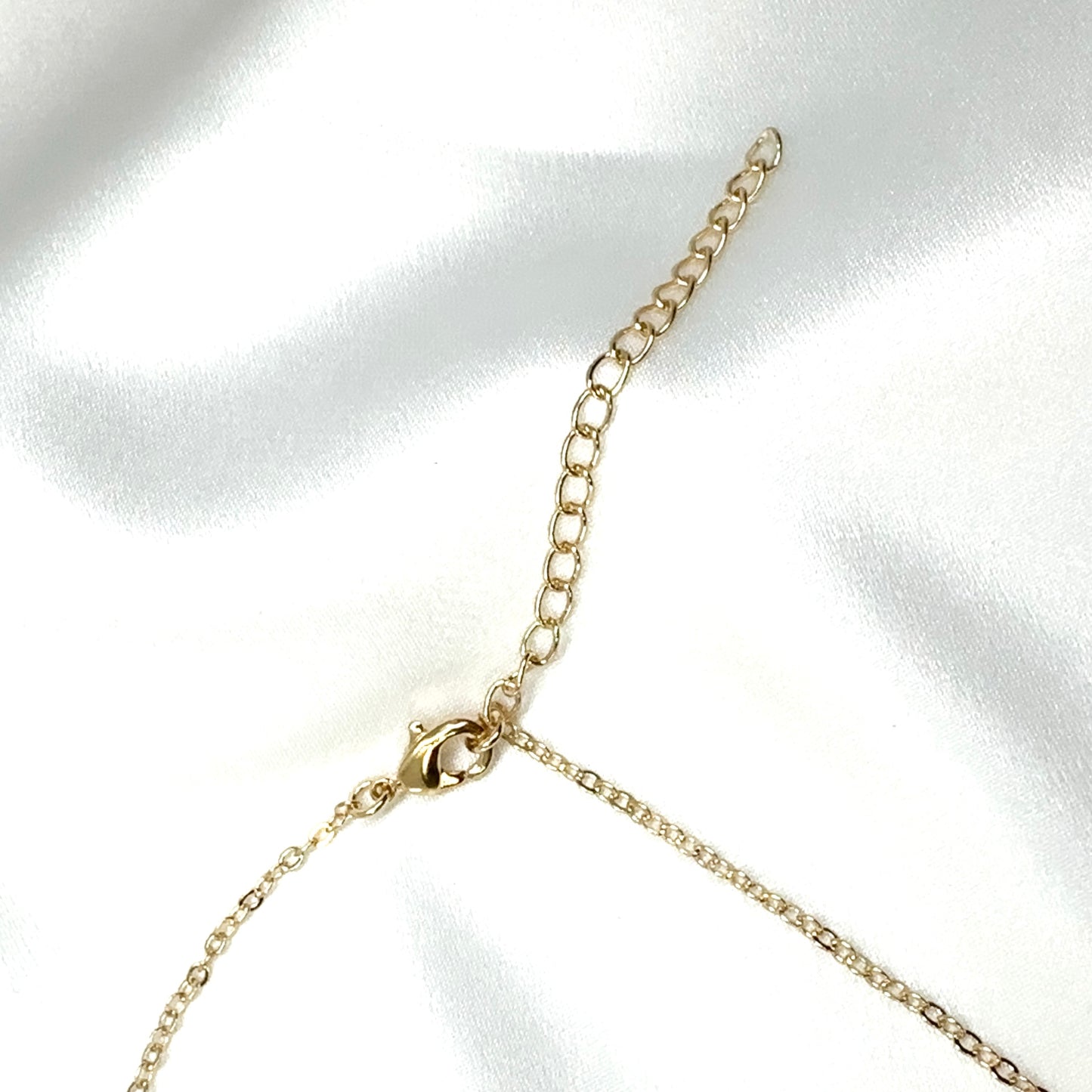set of gold plated minimalist heart pendant necklace and matching stud earrings