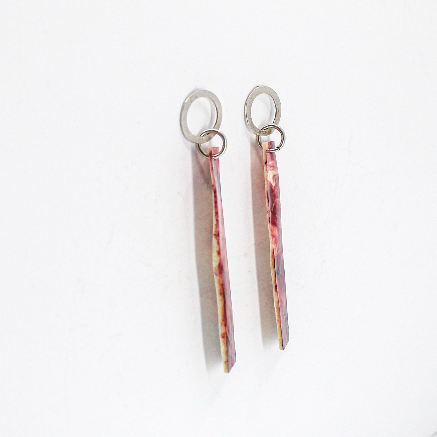 long dangling earrings • hammered sterling silver circle • red marbled resin element