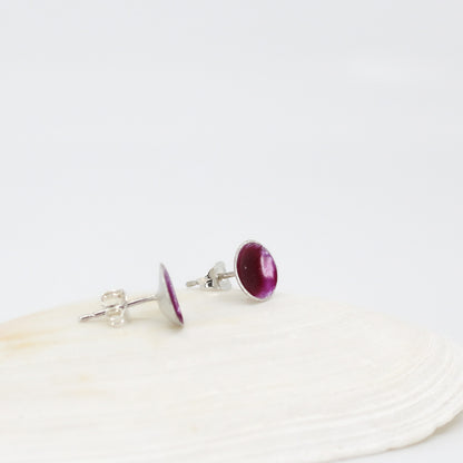 small round stud earrings in sterling silver filled with mauve purple resin