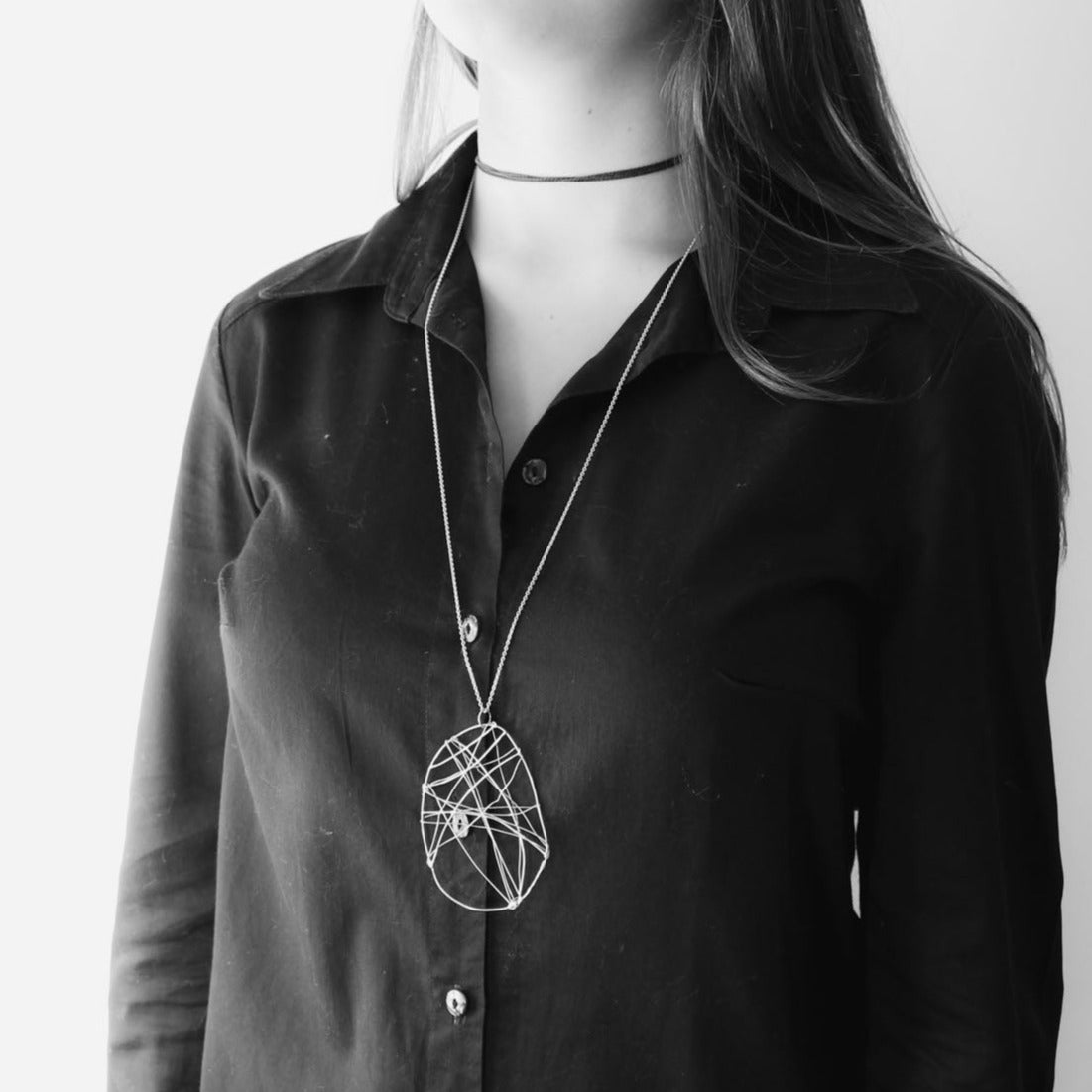 long  statement necklace in 925 eco sterling silver with wing shaped pendant