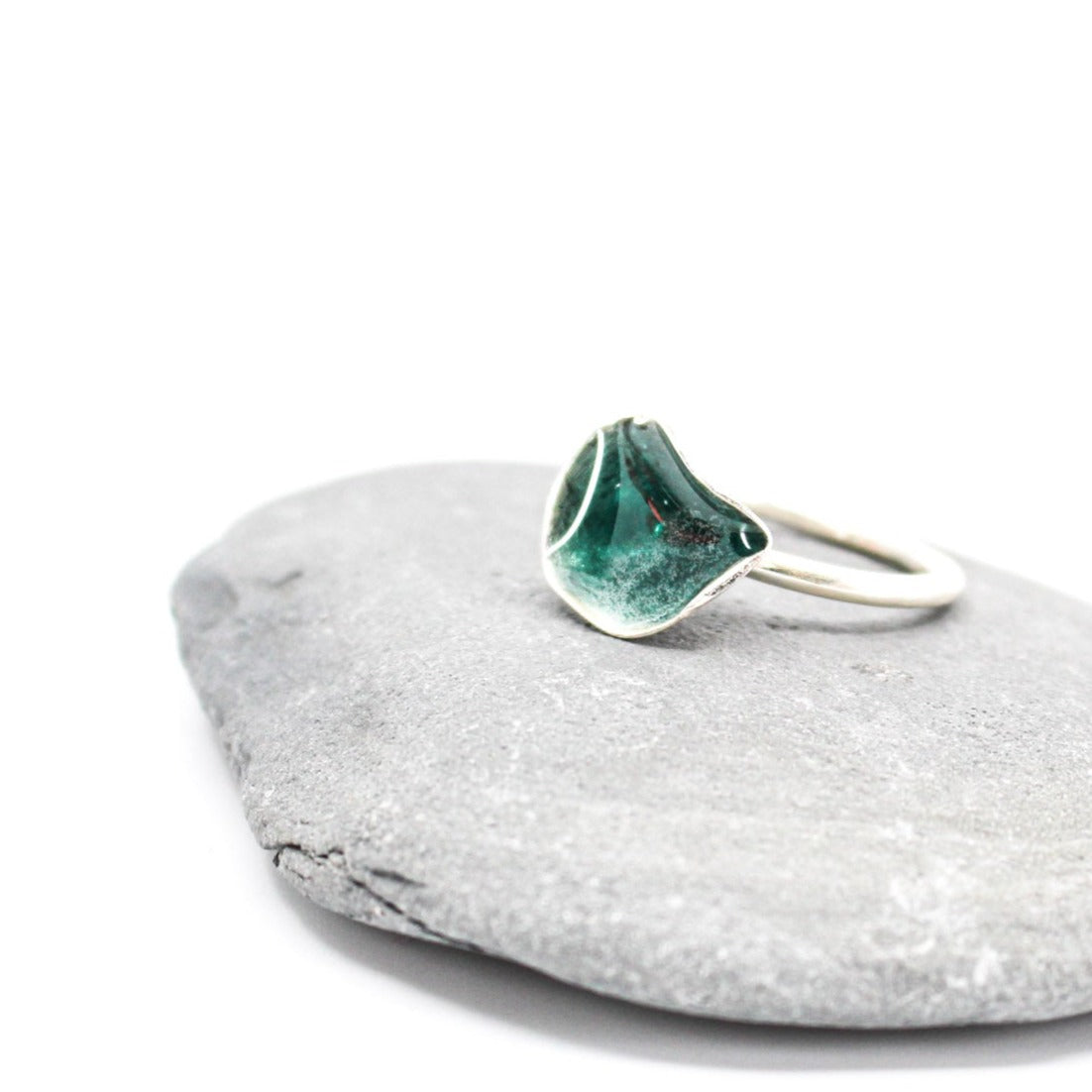silver statement ring coated with teal blue resin