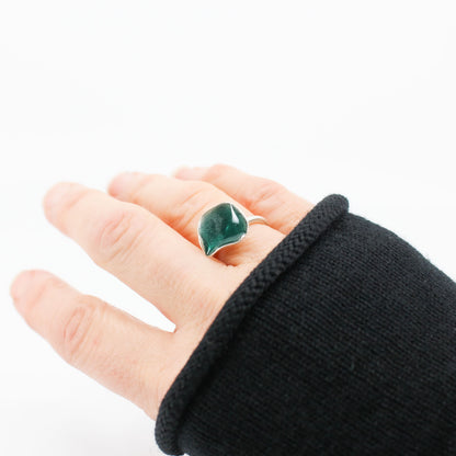 silver statement ring coated with teal blue resin