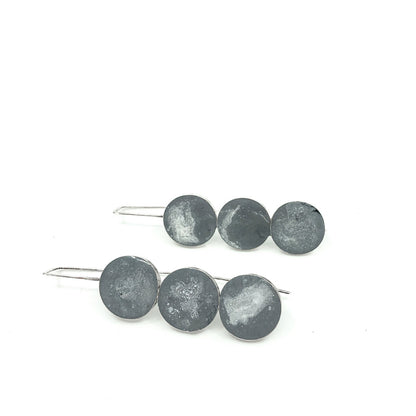 long grey dangly sterling silver earrings with three round resin elements