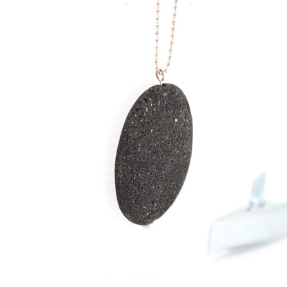 big lava stone pendant on long sterling silver ball chain