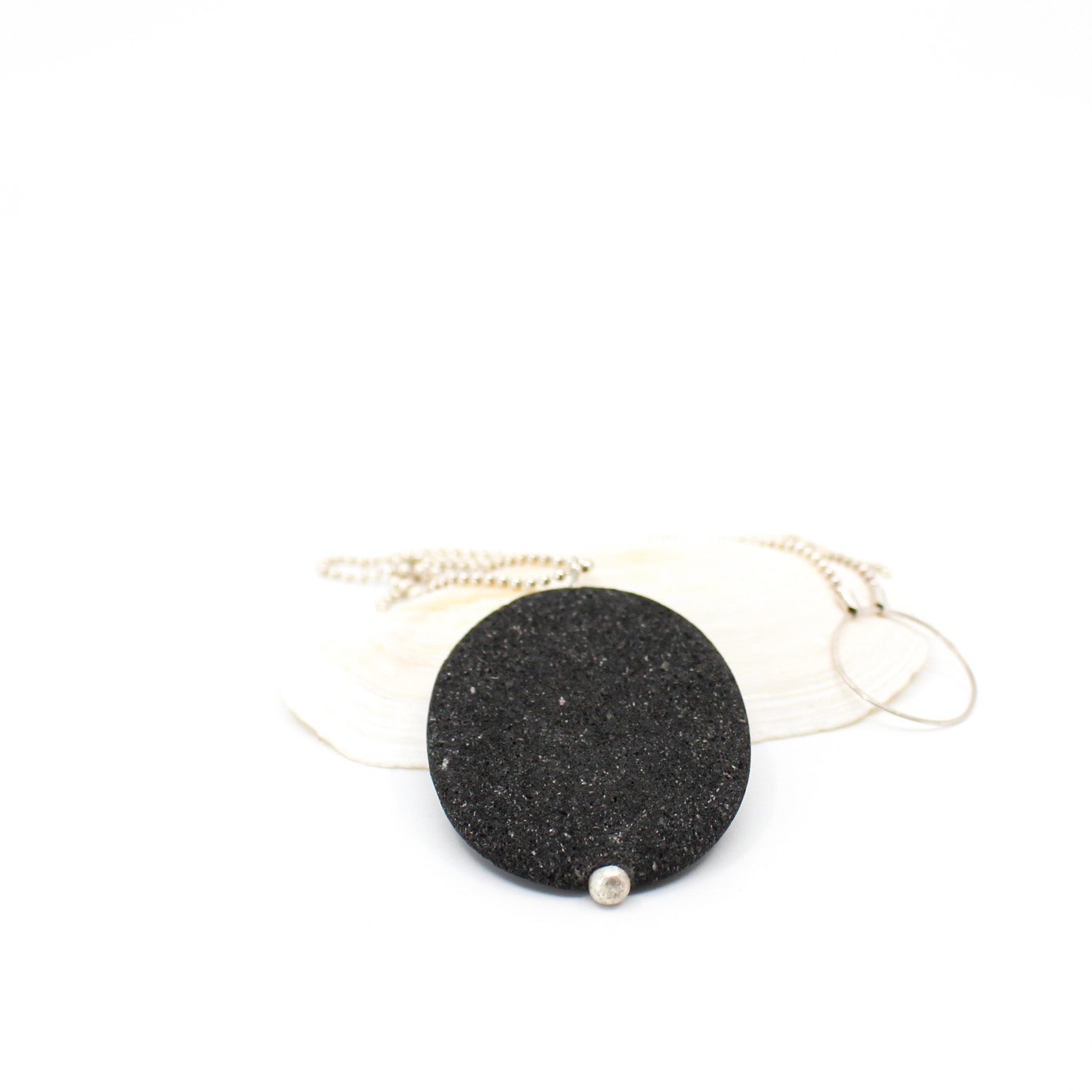 big lava stone pendant on long sterling silver ball chain