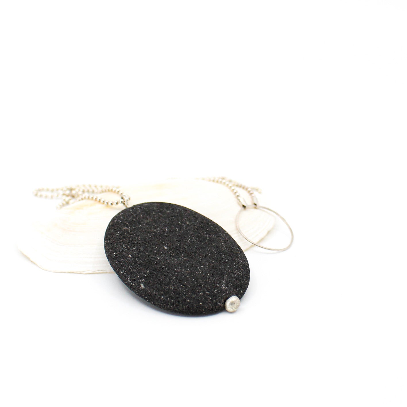 big lava stone pendant on long sterling silver ball chain